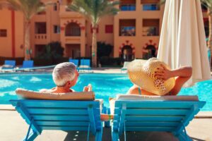 cspa image couple relaxing by pool